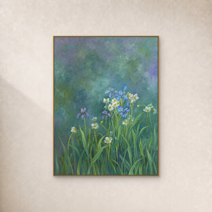 Blue and violet irises with white flowers on a teal ground, displayed in a slim gold floating frame on an ivory wall