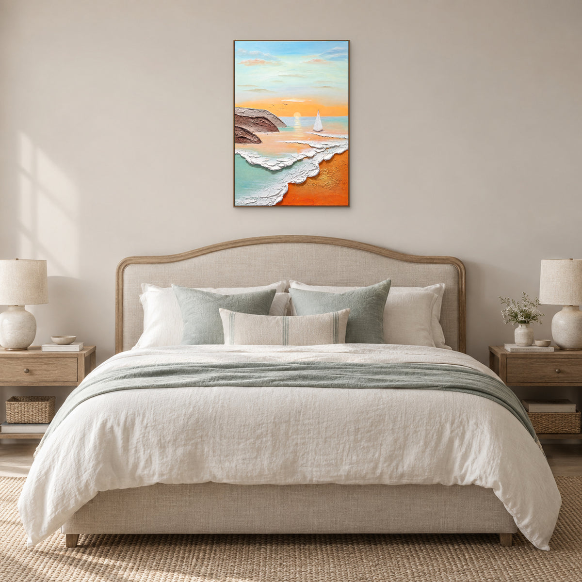 Turquoise sunrise seascape in an oak-tone frame centred above a curved headboard and cream linen