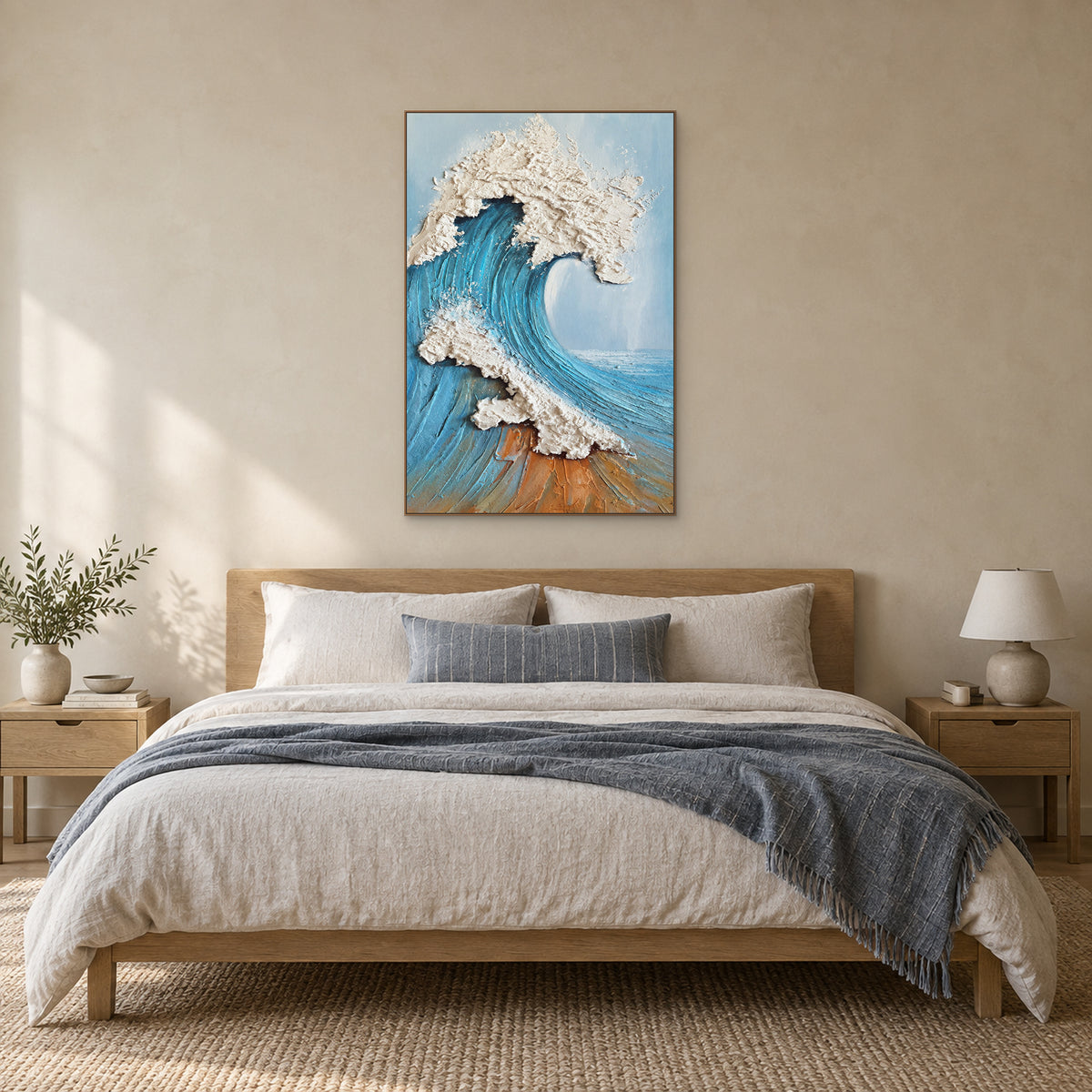 Vertical blue wave painting in an oak-tone floating frame centred above a neutral bed