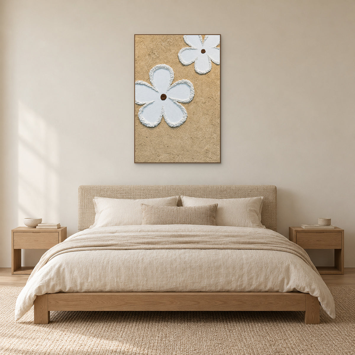 White floral relief in an oak-toned frame centred above a woven headboard and cream bedding