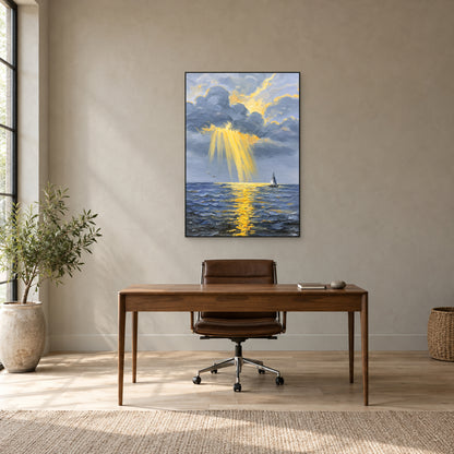Golden sunbeam seascape in a slim black frame above a wooden desk in a light-filled office.