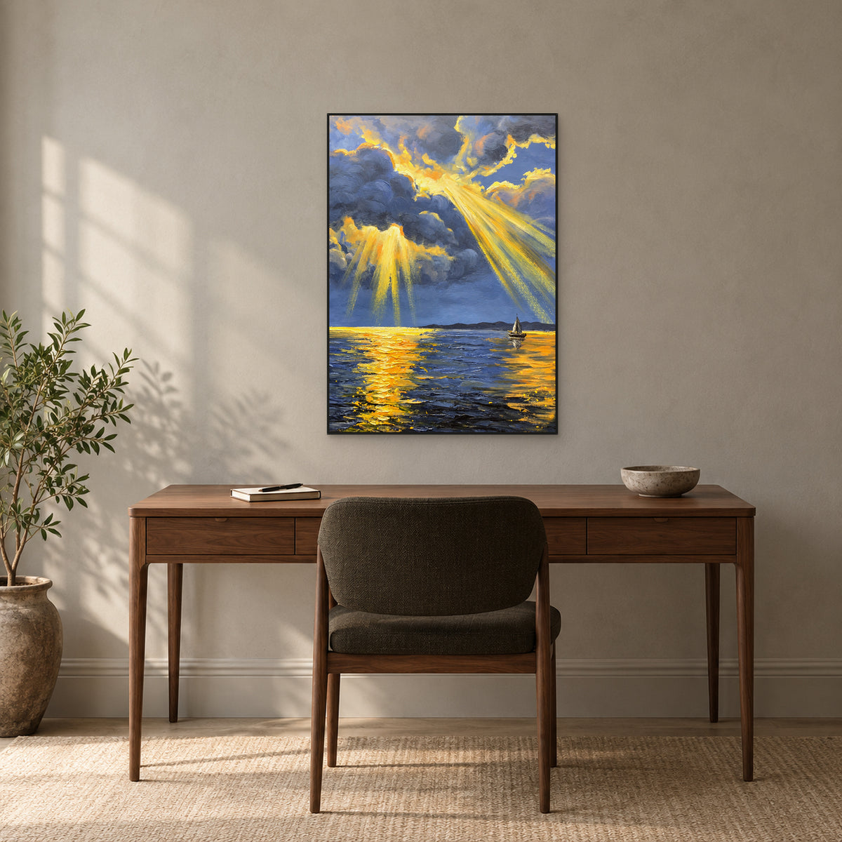 Blue and gold cloud painting in a slim black frame above a walnut desk in a softly lit study.