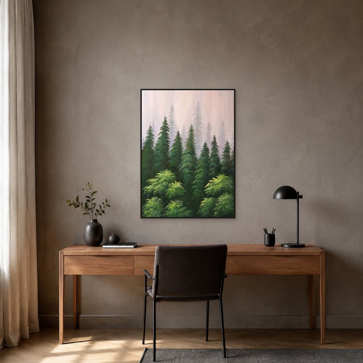 Misty pine forest painting in a slim black floating frame centred above a medium-oak home office desk