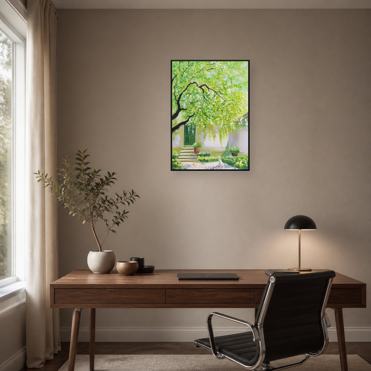 Spring Courtyard in a slim black floating frame above a walnut home office desk
