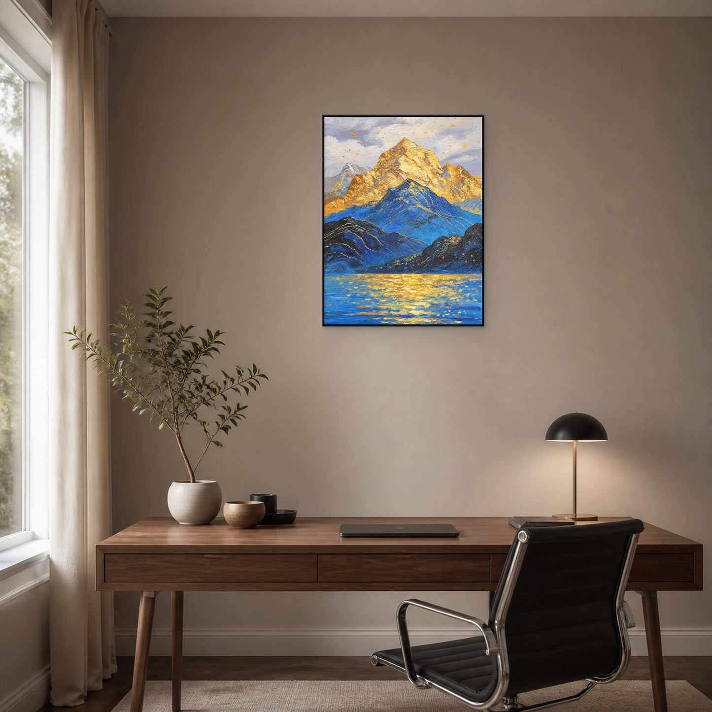 Golden Summit in a slim black floating frame above a walnut home office desk