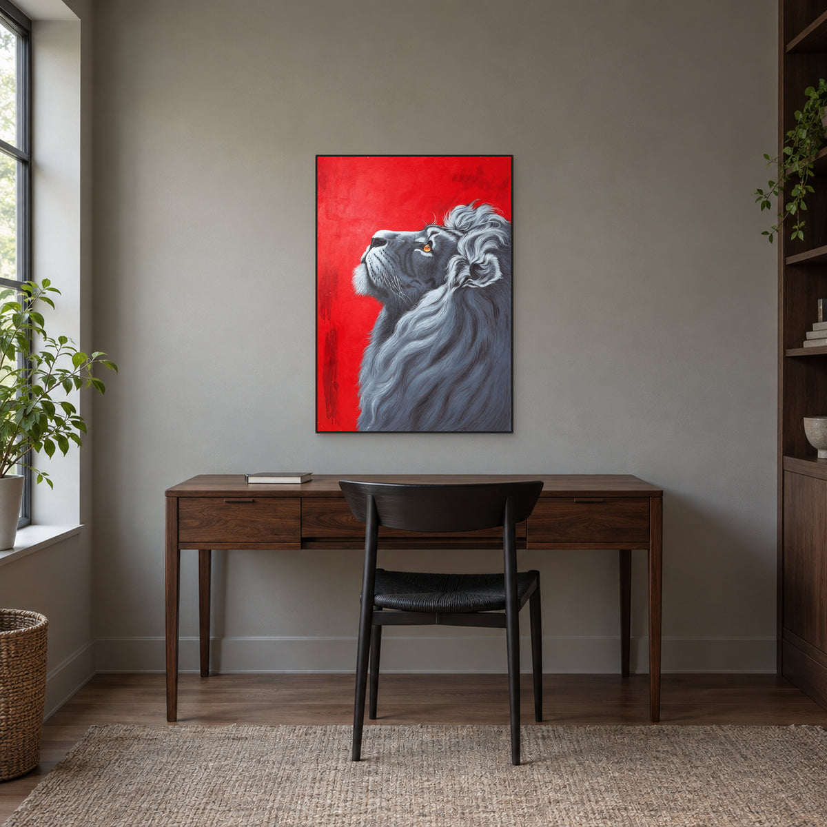 Silver-grey lion painting in a thin black frame above a walnut desk against a warm grey wall
