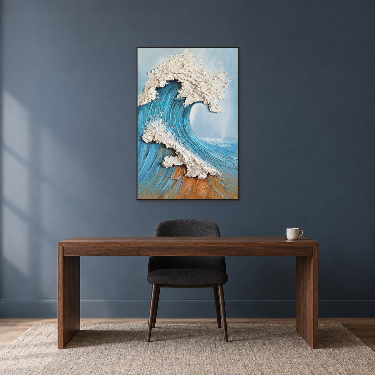 Blue wave and ivory foam in a black floating frame above a walnut desk
