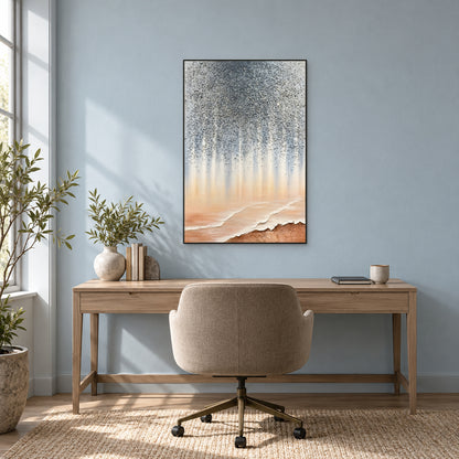 Grey and peach textured abstract in a thin black frame above a wooden desk against a pale blue office wall