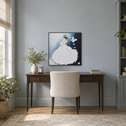 Blue and white figurative painting in a thin black frame above a wooden desk on a grey-blue office wall