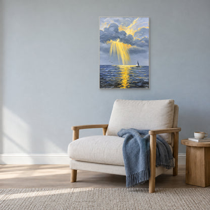 Hand-painted blue seascape in a white frame above an ivory lounge chair against a blue-grey wall.