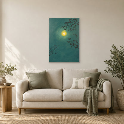 Green botanical moon painting in a white frame above a cream loveseat