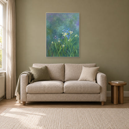 Vertical iris painting in a white floating frame above a two-seat sofa against a muted olive wall
