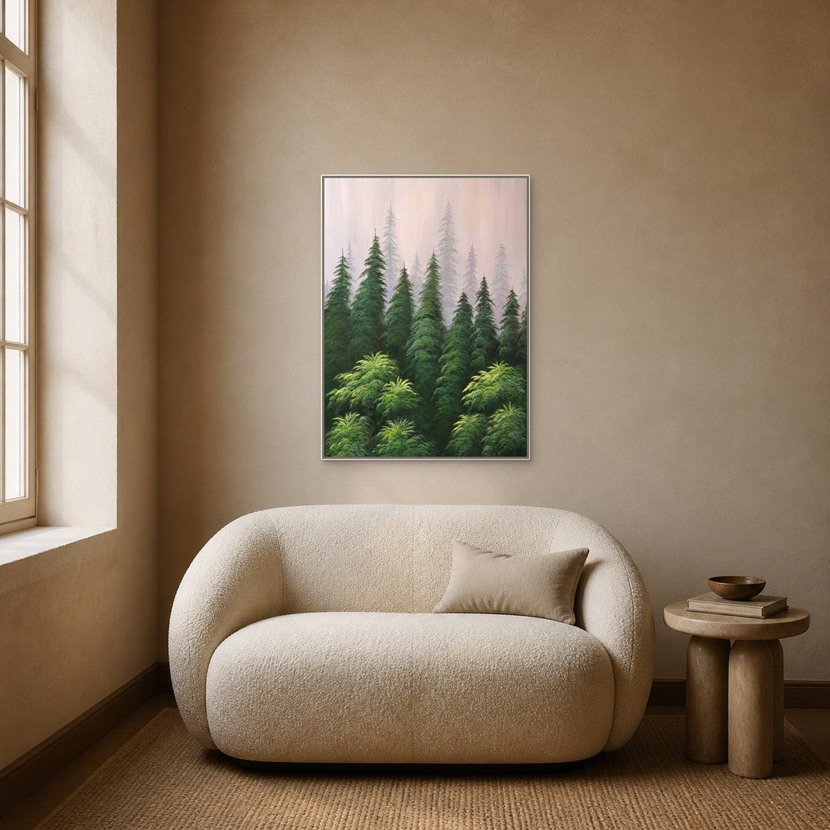 Misty pine forest painting in a slim white floating frame centred above an ivory boucle loveseat