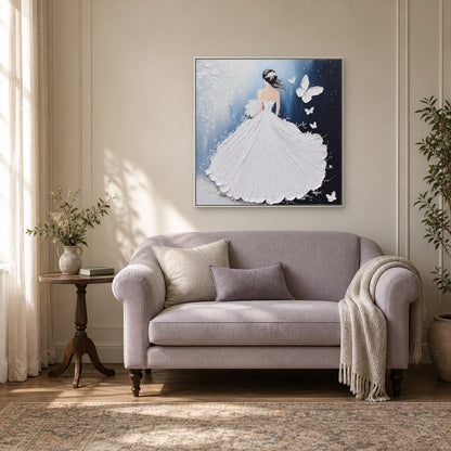 Woman and butterfly painting in a slim white frame above a curved settee in a softly lit reading nook