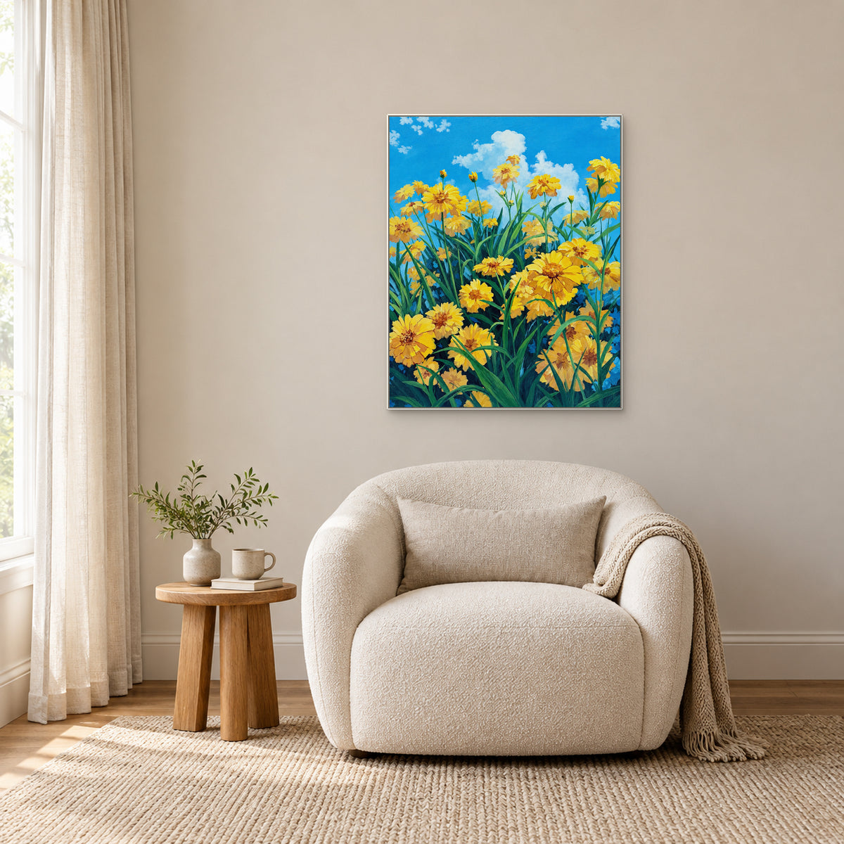 Yellow floral painting in a white floating frame above an upholstered reading chair