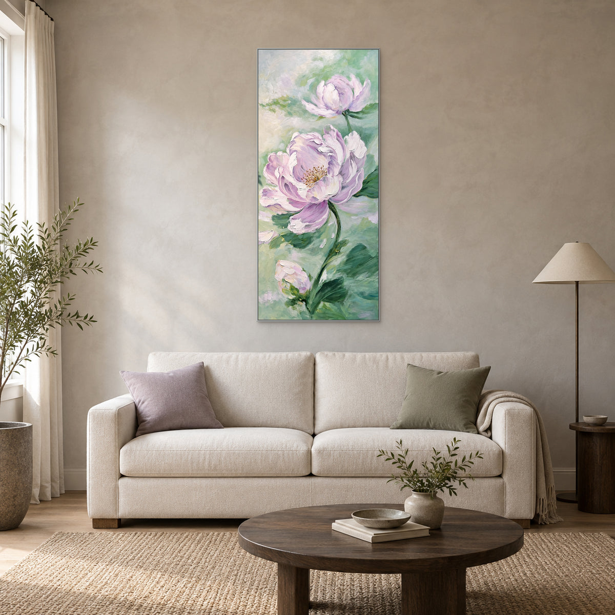 Vertical lilac peonies in a silver-tone floating frame above a cream sofa with lilac and sage cushions