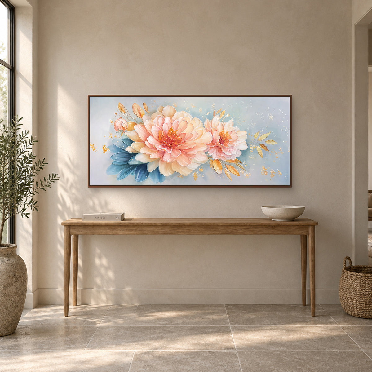 Pink peonies and blue leaves in a walnut-toned floating frame above a slender wooden entryway console
