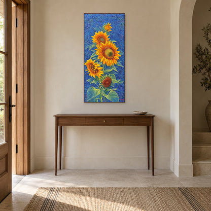 Sunflower painting in a walnut-tone frame above a slender console in a softly lit entryway