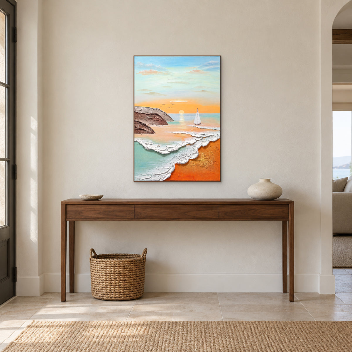 Sunrise sailboat painting in a walnut-tone frame aligned above a slender entrance console