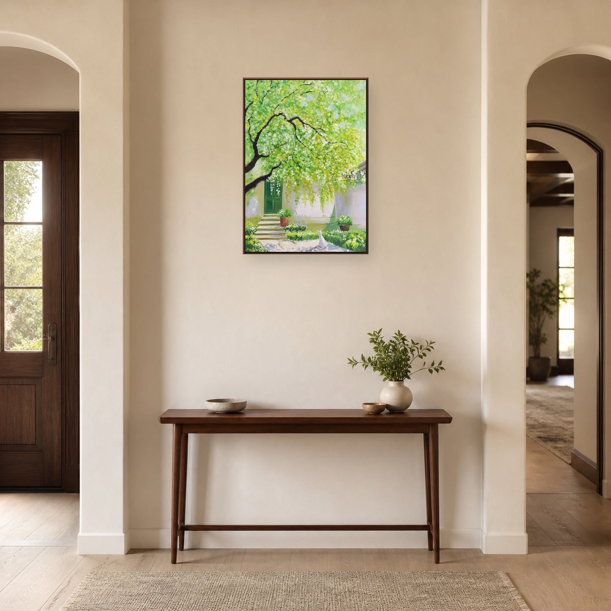 Spring Courtyard in a slim walnut floating frame above a wood entryway console