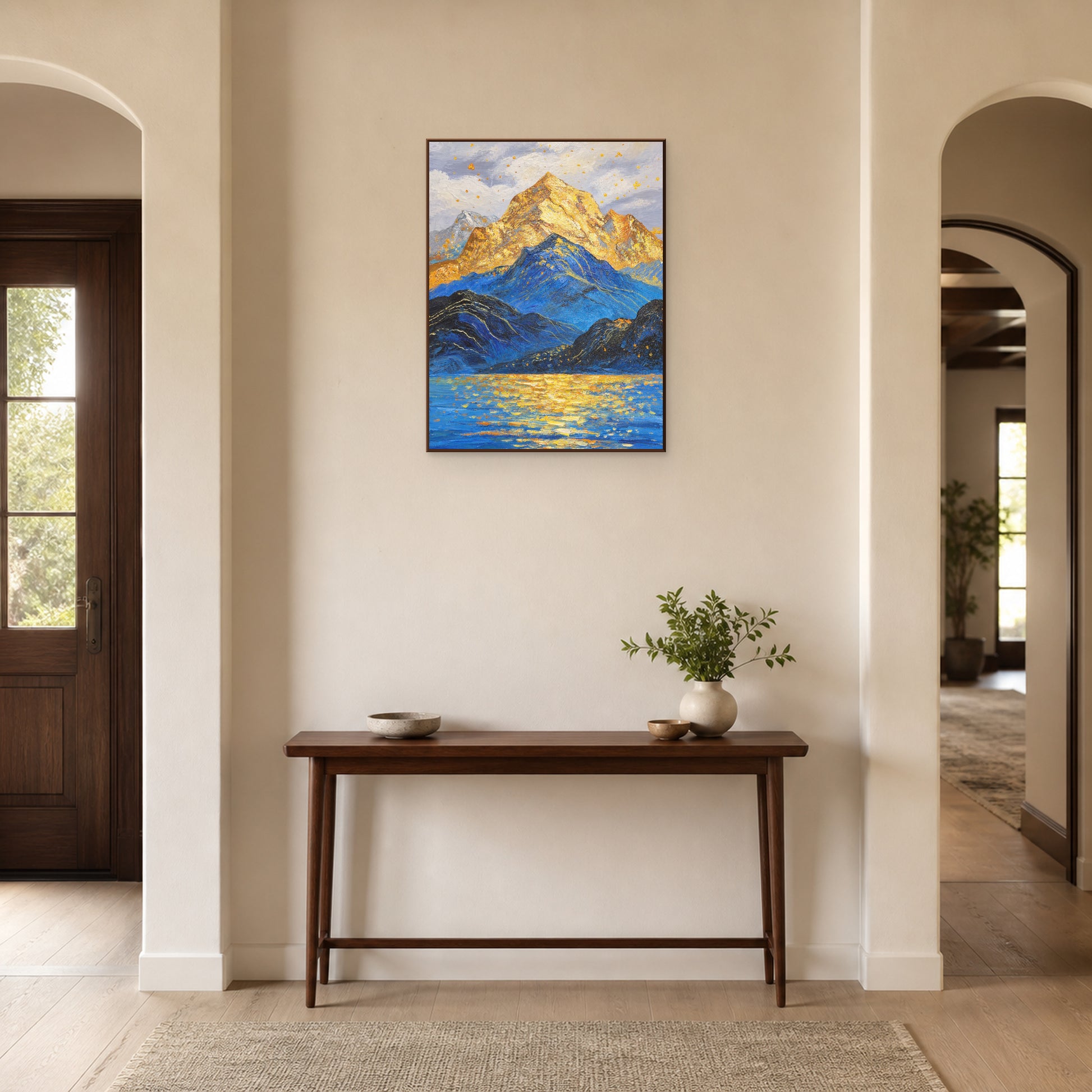 Golden Summit in a slim walnut floating frame above a wood entryway console