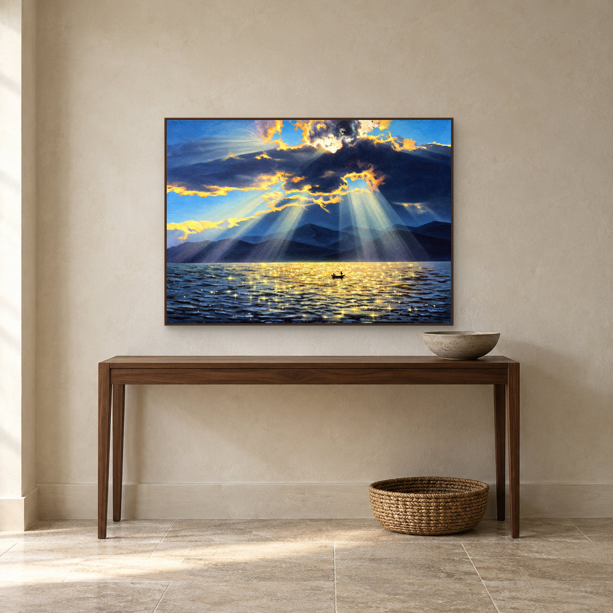 Golden light over a blue mountain lake in a walnut-look frame above a narrow entryway console