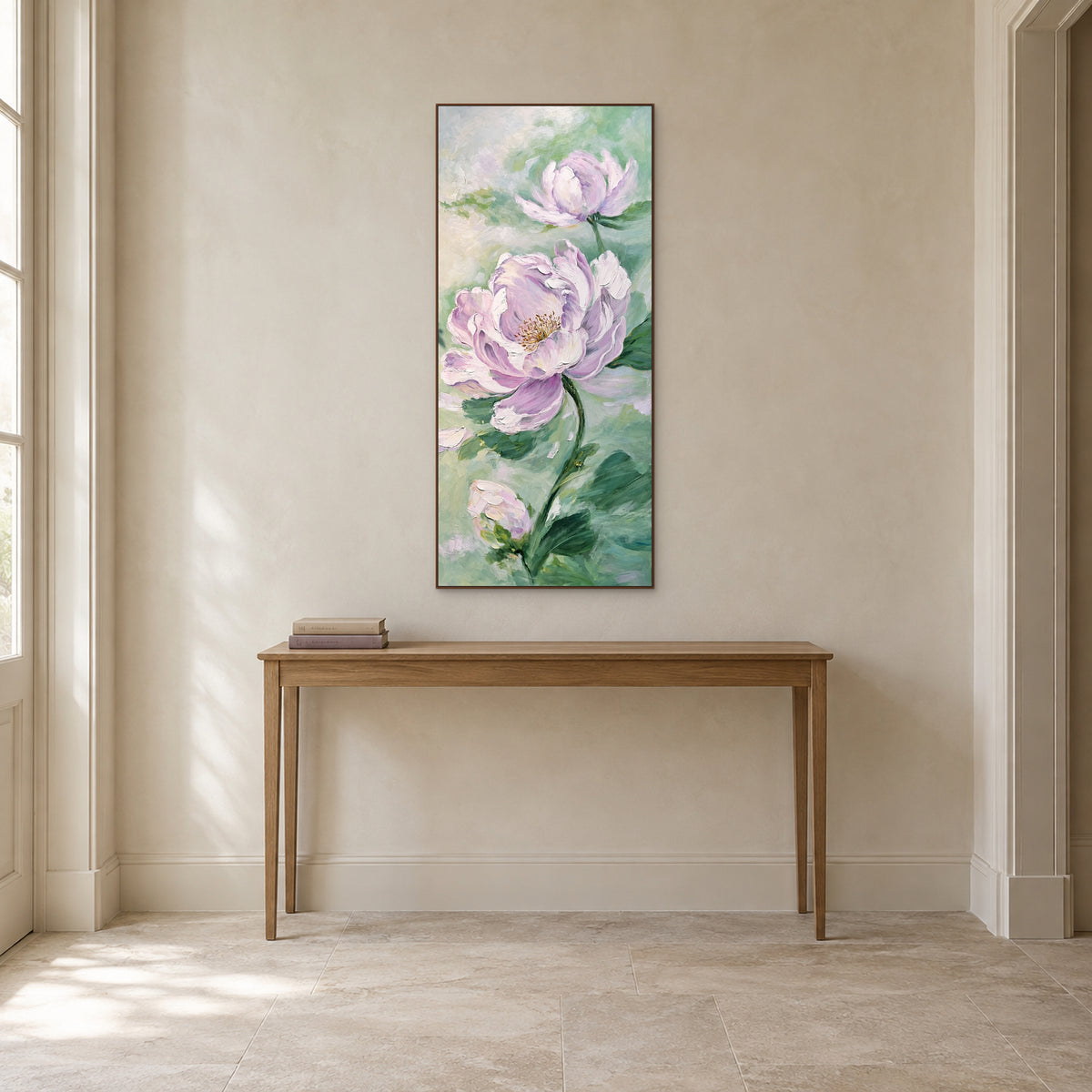 Lilac peony painting in a walnut-tone floating frame centred over a slim wooden entryway console