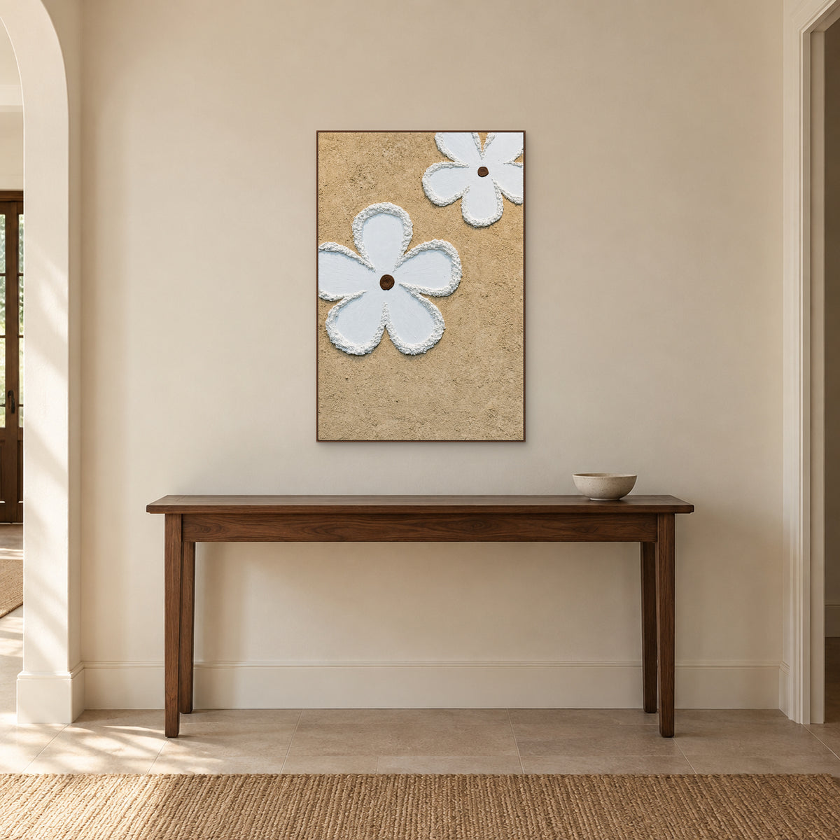 White Petal Duet in a walnut-toned frame centred above a dark wooden entryway console