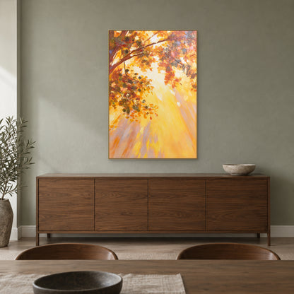 Golden foliage painting in a champagne-coloured floating frame above a walnut-toned dining room sideboard.