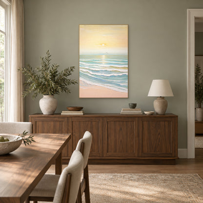 Morning Tide pastel seascape in a champagne-tone floating frame above a dining-room sideboard