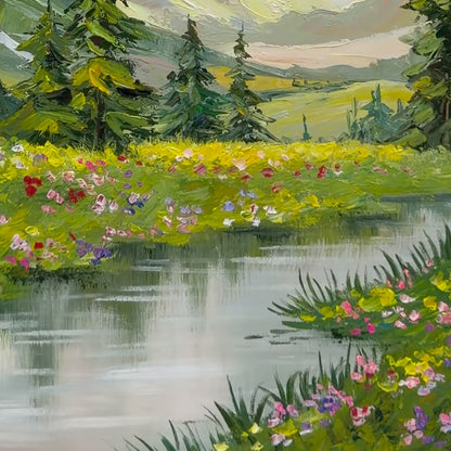 Close view of painted wildflowers and reflective water in Sunlit Alpine Meadow