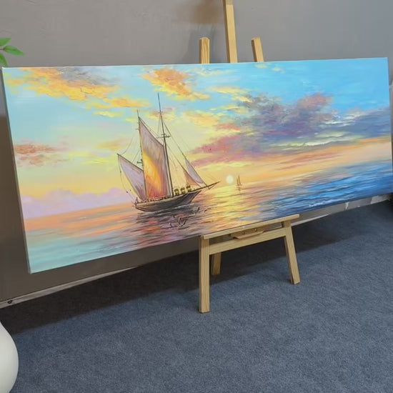 Full view and close-ups of the sailboat, sunset clouds and painted water