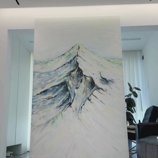 Video showing the full snowy mountain painting, its raised surface and the completed artwork