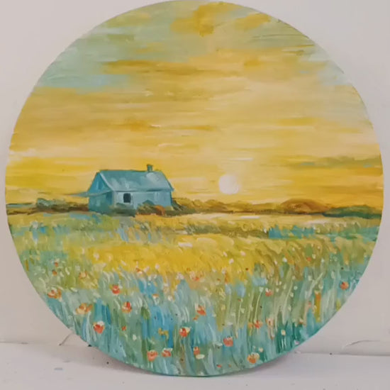 Studio video moving closer to the round cottage painting, then returning to a full view