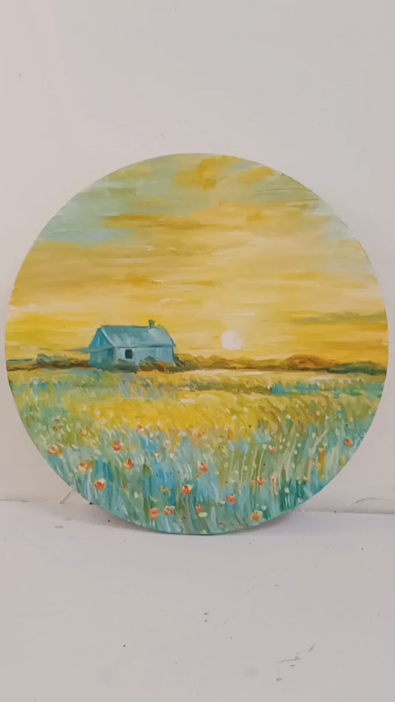 Studio video moving closer to the round cottage painting, then returning to a full view