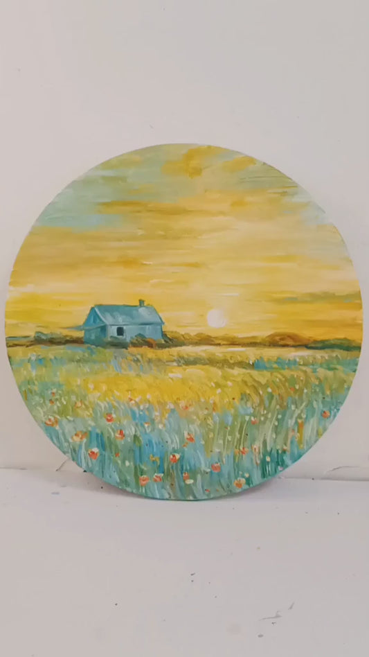 Studio video moving closer to the round cottage painting, then returning to a full view