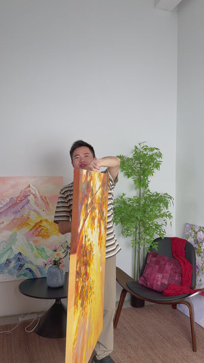 The autumn tree painting turns into frontal view, followed by its complete framed presentation on an ivory wall.