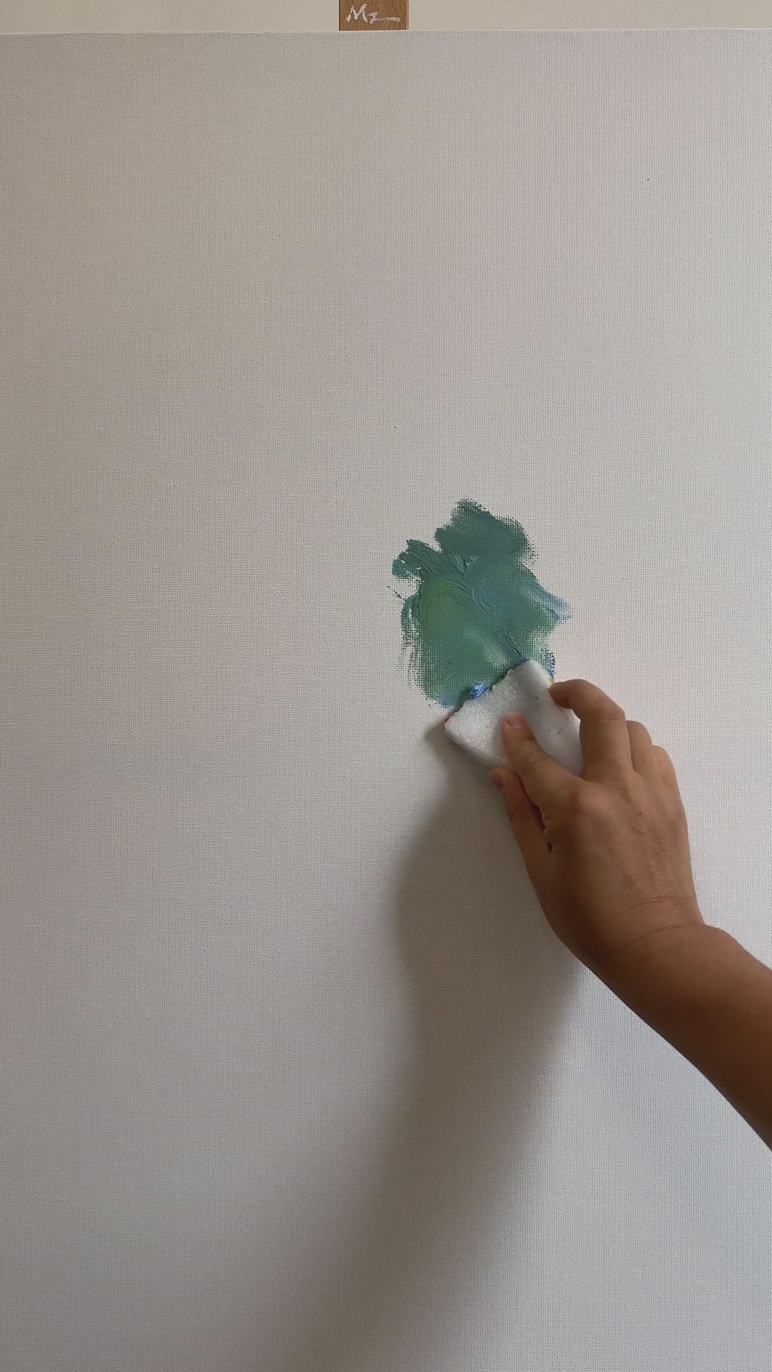 Floral painting process from teal ground to blue irises, white flowers and slender leaves, followed by the finished artwork