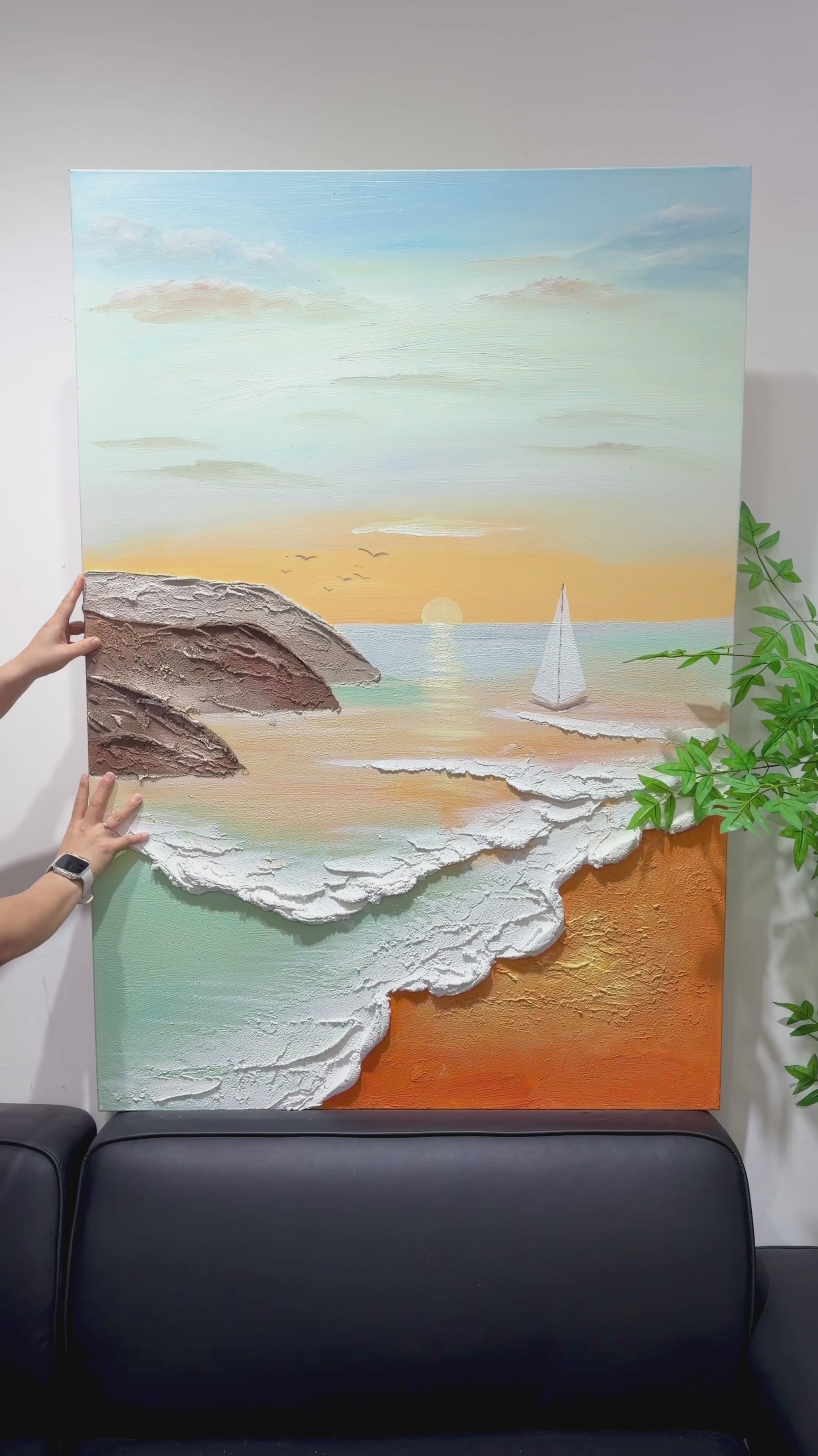 Studio views of a sunrise sailboat, textured rocks and white waves, ending with the complete framed artwork