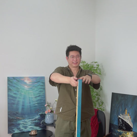 The turquoise and gold boat painting turns into view, followed by a framed product view on an ivory wall