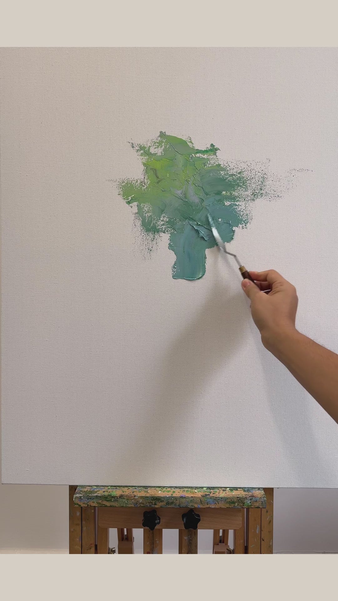Palette-knife painting process showing green layers, white jasmine flowers and the finished framed composition