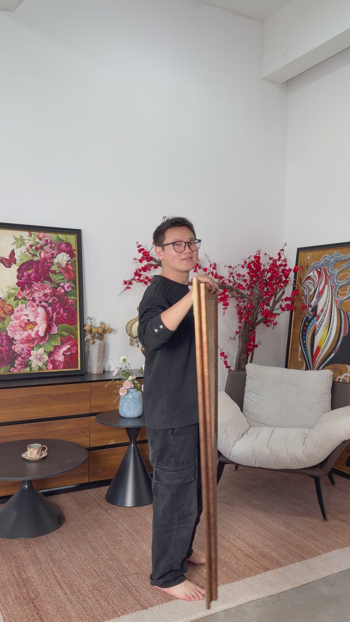 Studio view of the magnolia painting turning towards the camera, followed by a framed wall illustration