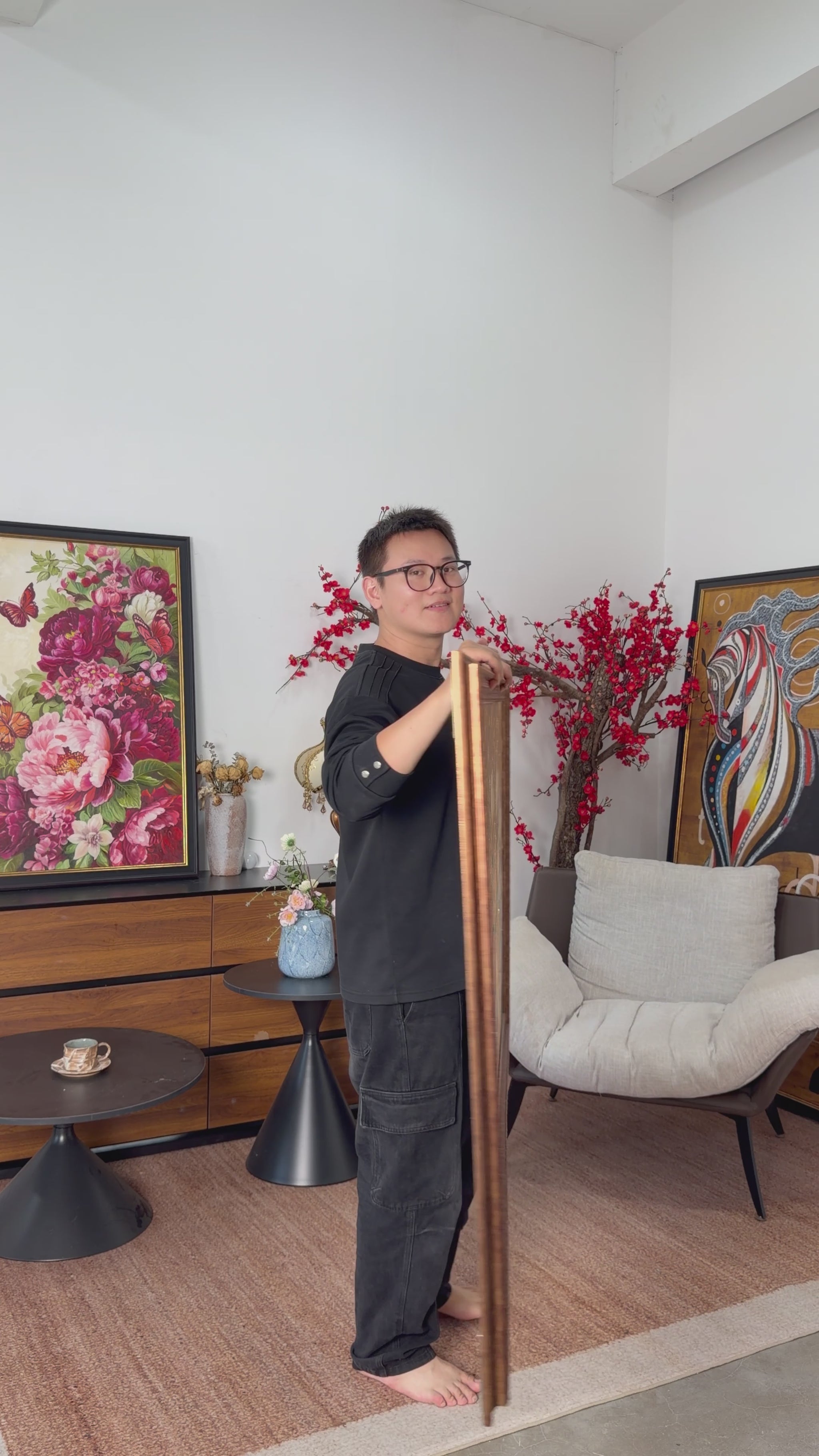Studio view of the magnolia painting turning towards the camera, followed by a framed wall illustration